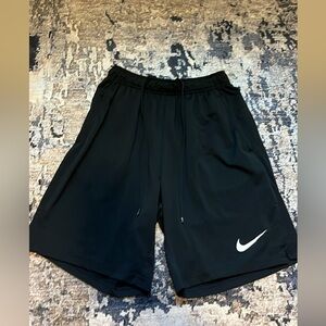 Men’s Nike DriFit shorts - M